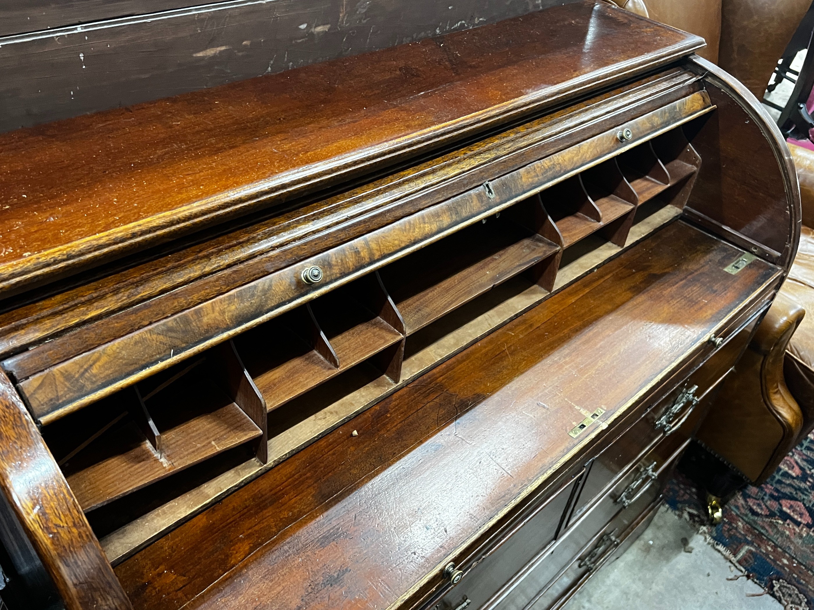 A mahogany tambour fronted cylinder bureau, width 105cm, depth 45cm, height 95cm